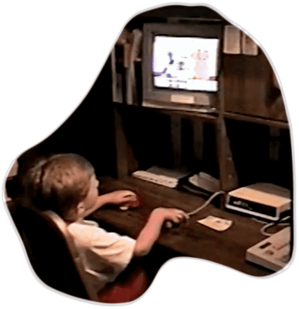 Young Josh sitting at a computer